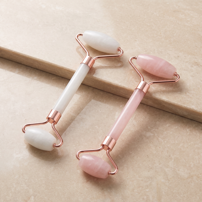 The Sculpt Duo contour roller and scraping tool laid side by side