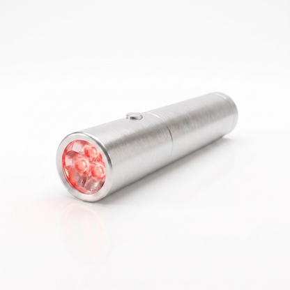 The Glow Wand handheld red light device on a white background